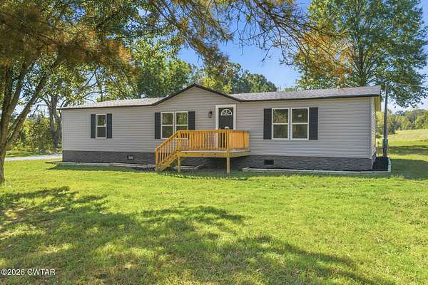 14.3 Acres of Land with Home for Sale in Milan, Tennessee