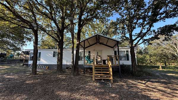 2 Acres of Land with Home for Lease in Streetman, Texas