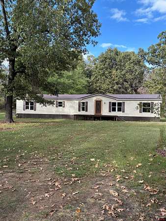 3.58 Acres of Land with Home for Sale in Mountain Home, Arkansas