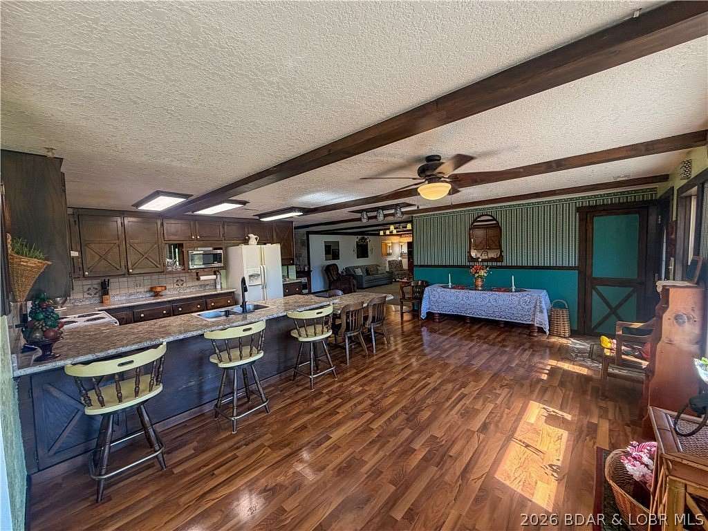 16.2 Acres of Land with Home for Sale in Versailles, Missouri