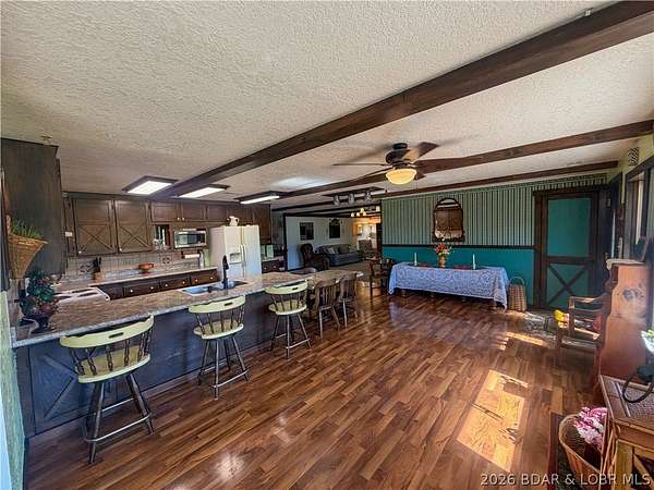 16.2 Acres of Land with Home for Sale in Versailles, Missouri