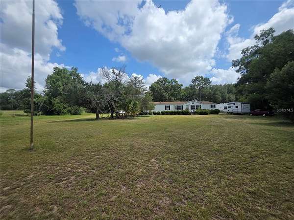 4.64 Acres of Land with Home for Lease in Summerfield, Florida
