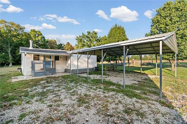 20.7 Acres of Land with Home for Sale in Brookfield, Missouri