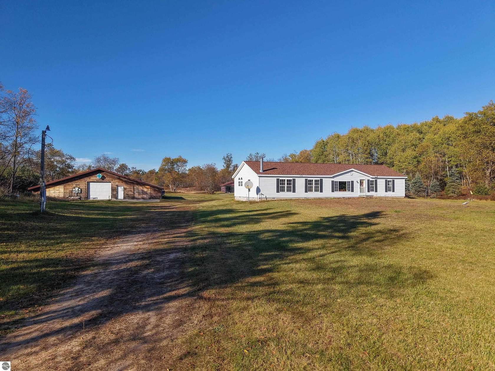 10 Acres of Land with Home for Sale in Fife Lake, Michigan