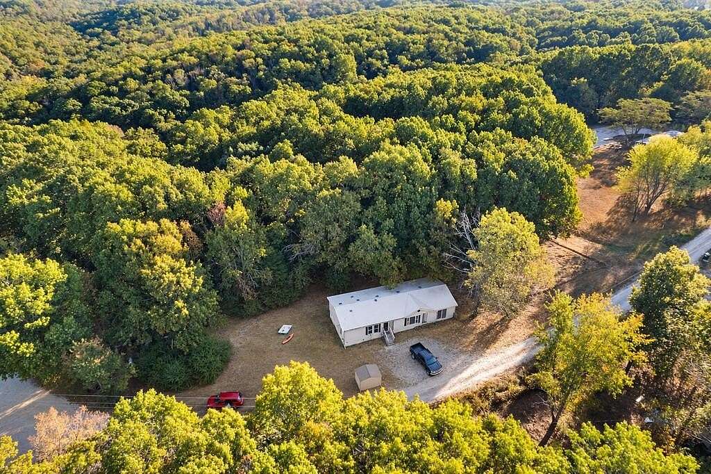 3 Acres of Land with Home for Sale in Reeds Spring, Missouri