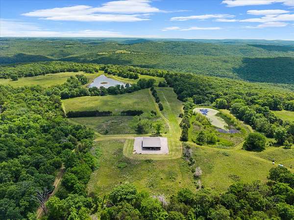 960 Acres of Land with Home for Sale in Canehill, Arkansas