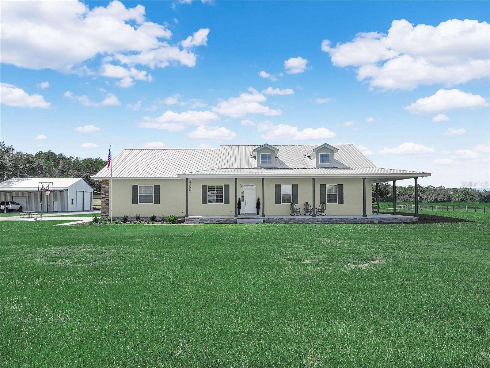 22.6 Acres of Agricultural Land with Home for Sale in Polk City, Florida