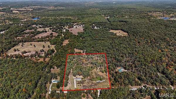 10 Acres of Land with Home for Sale in Mineral Point, Missouri