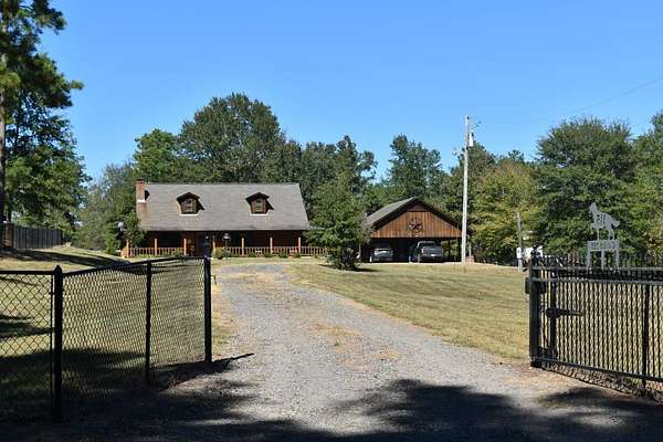 27.9 Acres of Land with Home for Sale in Magnolia, Arkansas