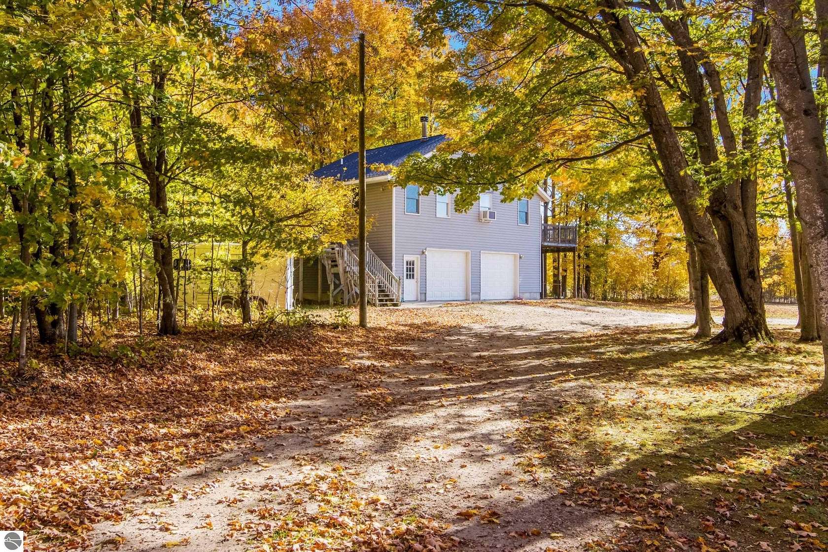 10 Acres of Recreational Land with Home for Sale in Buckley, Michigan