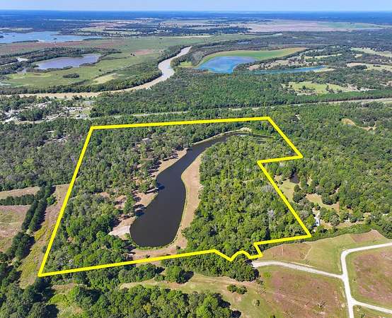 74.5 Acres of Recreational Land with Home for Sale in Trinity, Texas