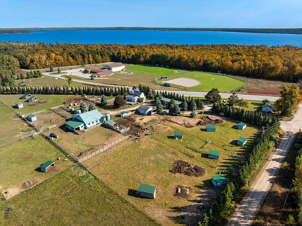 31.7 Acres of Agricultural Land with Home for Sale in Alanson, Michigan