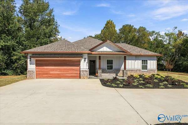 4.76 Acres of Land with Home for Sale in Owens Cross Roads, Alabama
