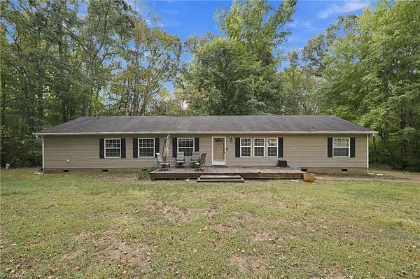1.55 Acres of Land with Home for Sale in Stokesdale, North Carolina
