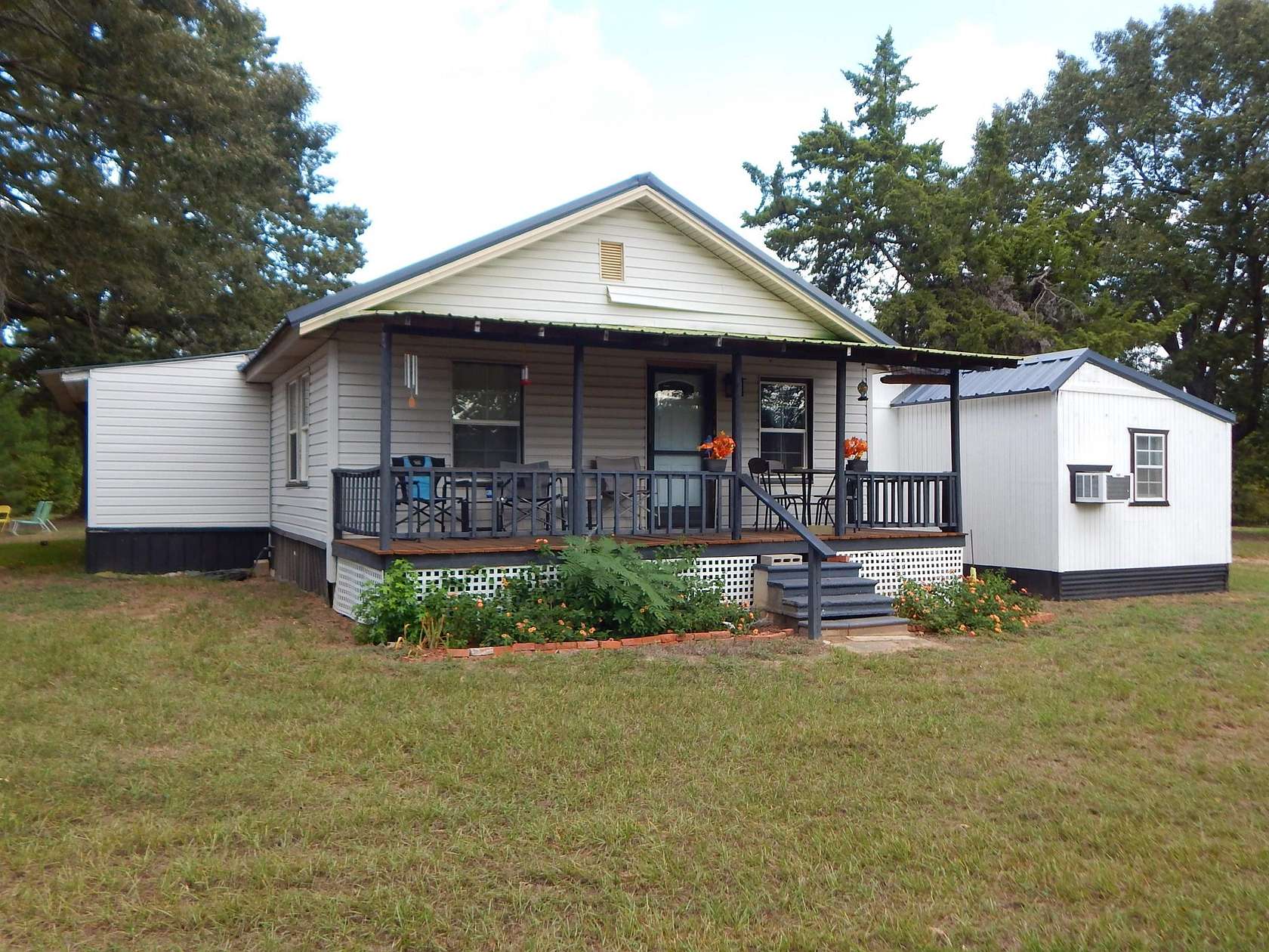 5.85 Acres of Land with Home for Sale in Gilmer, Texas