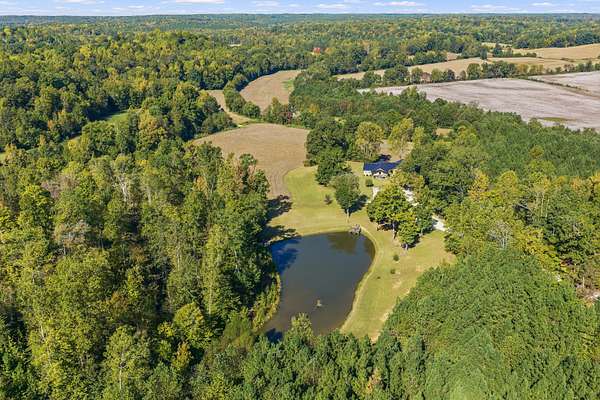 315 Acres of Land with Home for Sale in Holladay, Tennessee