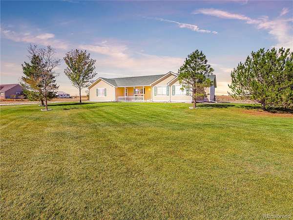 5.6 Acres of Land with Home for Sale in Strasburg, Colorado