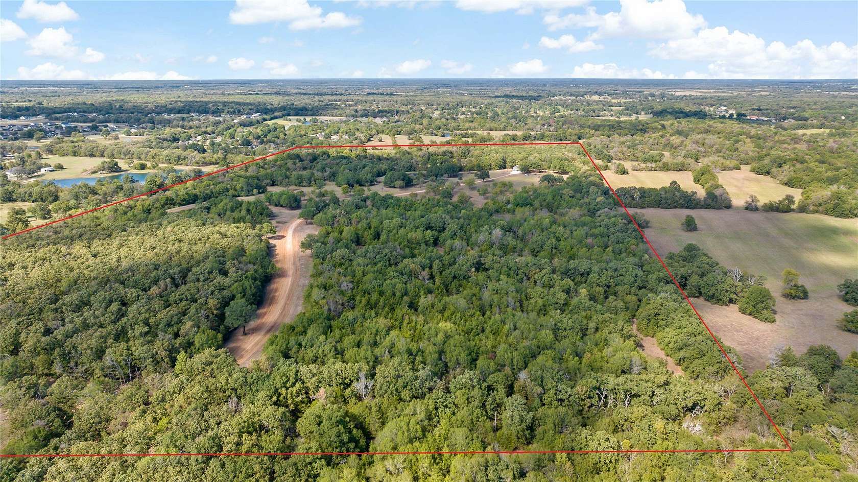71.6 Acres of Recreational Land with Home for Sale in Paris, Texas