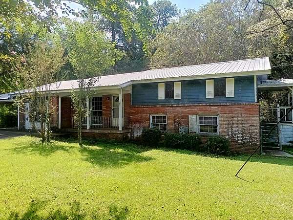 1.56 Acres of Land with Home for Sale in Carriere, Mississippi