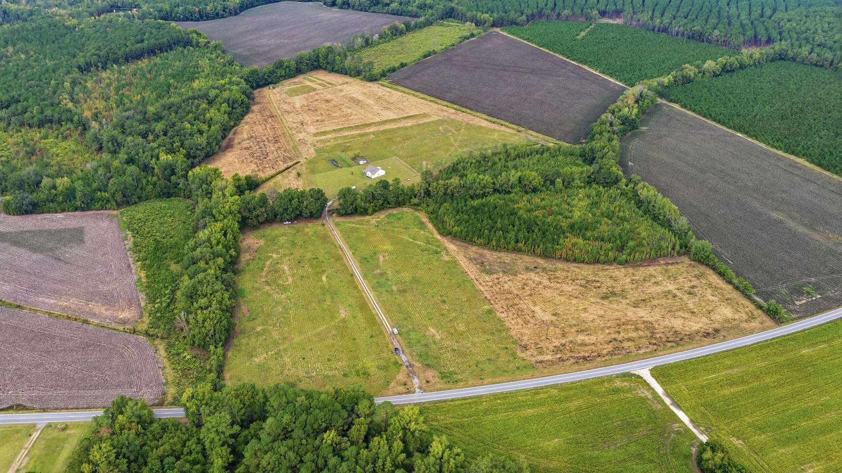 58 Acres of Agricultural Land with Home for Sale in Lamar, South Carolina