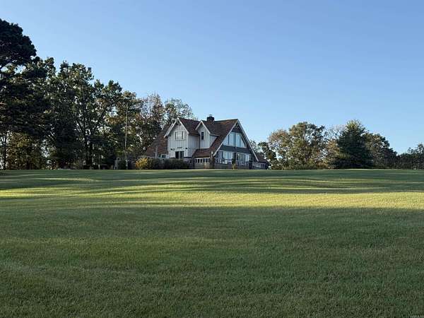 6.9 Acres of Land with Home for Sale in Clarksville, Arkansas
