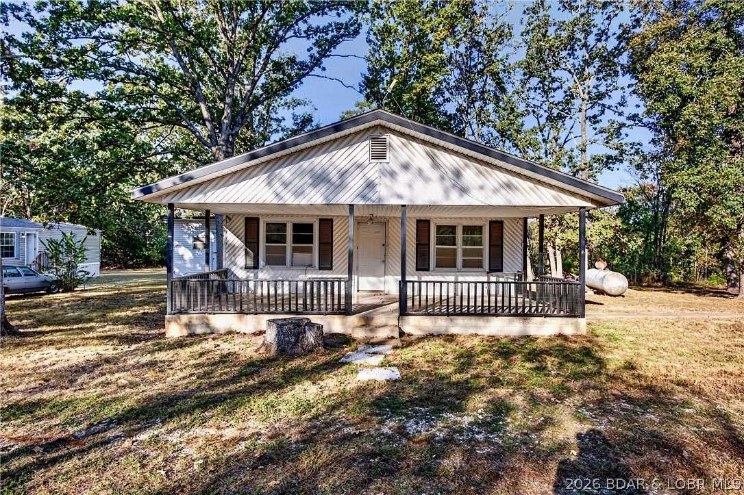 3.86 Acres of Land with Home for Sale in Camdenton, Missouri