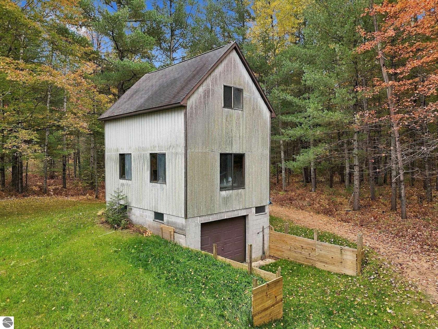 20 Acres of Recreational Land with Home for Sale in Traverse City, Michigan