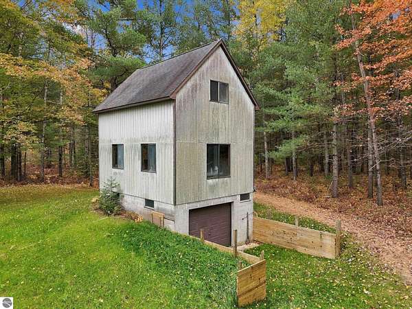 20 Acres of Recreational Land with Home for Sale in Traverse City, Michigan