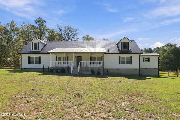 9.8 Acres of Land with Home for Sale in Maxton, North Carolina