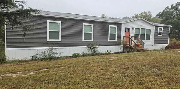 5 Acres of Land with Home for Sale in Irvine, Kentucky
