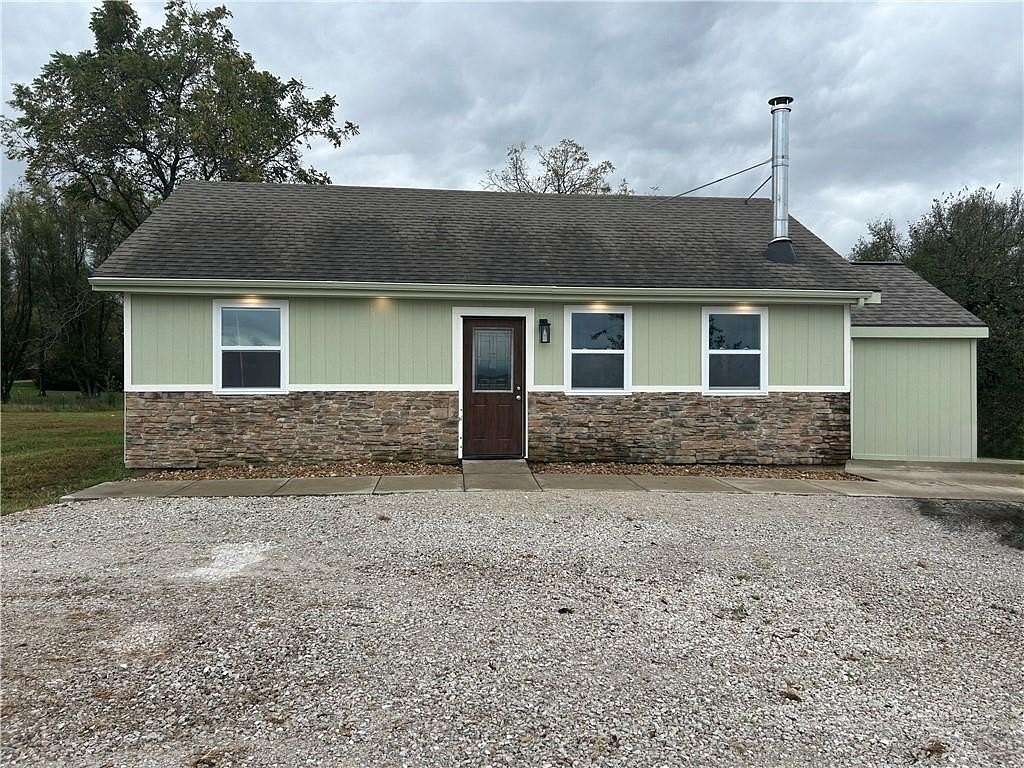 11 Acres of Recreational Land with Home for Sale in Kingsville, Missouri