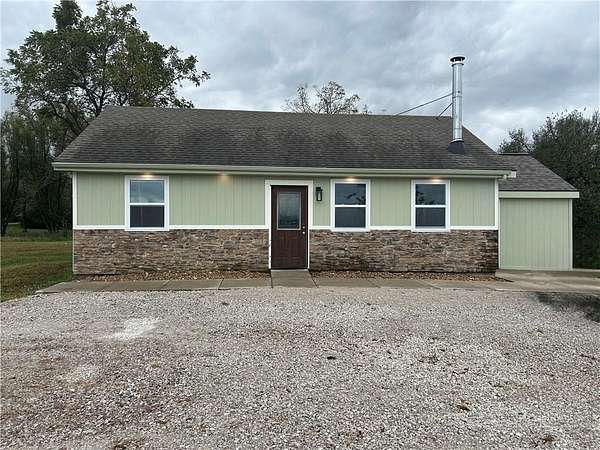 11 Acres of Recreational Land with Home for Sale in Kingsville, Missouri