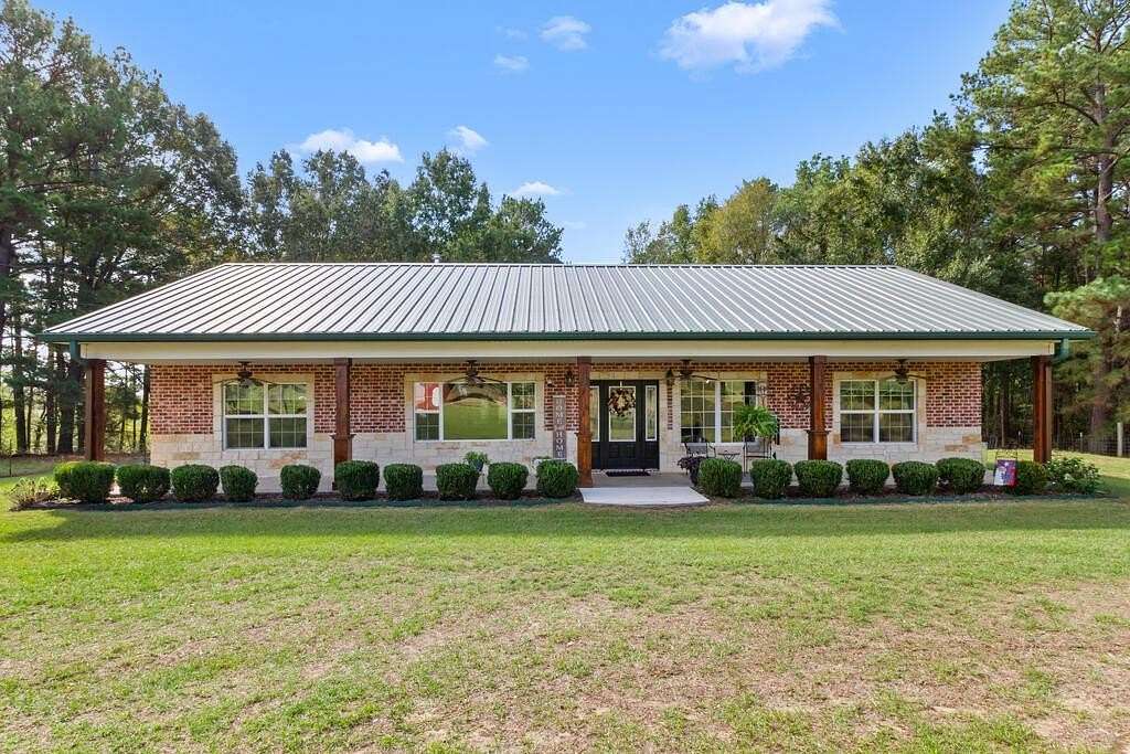 20.3 Acres of Agricultural Land with Home for Sale in Elkhart, Texas