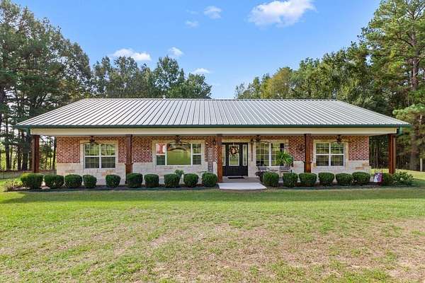20.3 Acres of Agricultural Land with Home for Sale in Elkhart, Texas