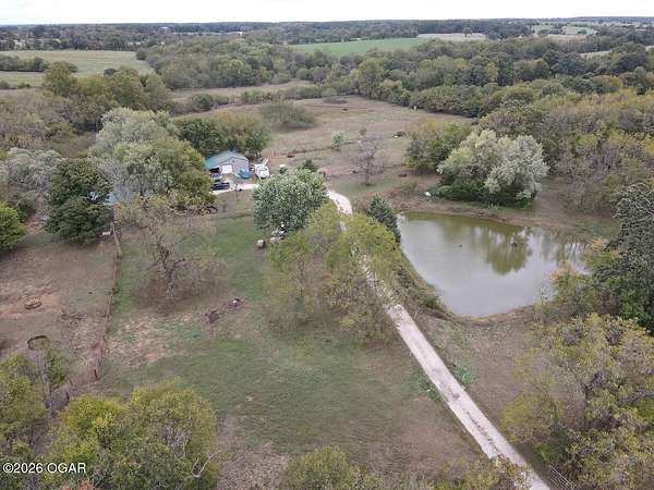 27.5 Acres of Land with Home for Sale in Sarcoxie, Missouri