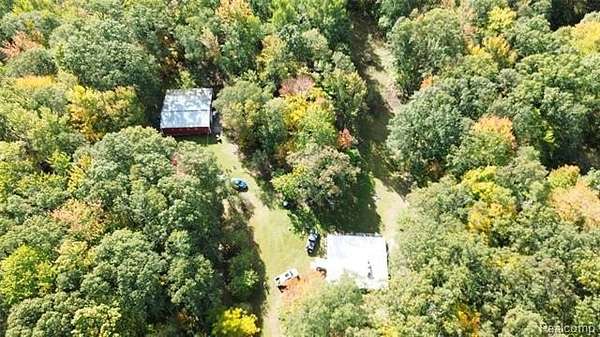 100 Acres of Recreational Land with Home for Sale in Hawes Township, Michigan