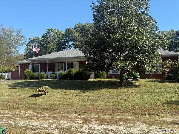 10 Acres of Land with Home for Sale in Stoutland, Missouri