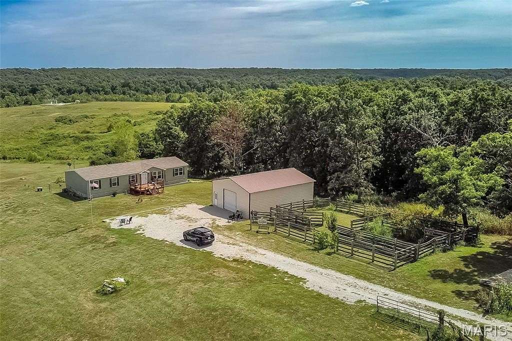 9.79 Acres of Land with Home for Sale in Richwoods, Missouri