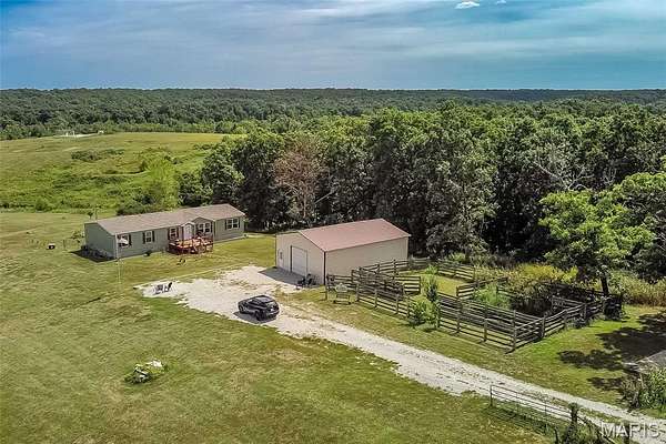 9.79 Acres of Land with Home for Sale in Richwoods, Missouri