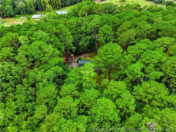 9.59 Acres of Land with Home for Sale in Sanford, North Carolina