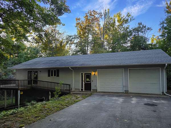 10.6 Acres of Land with Home for Sale in Boyne City, Michigan
