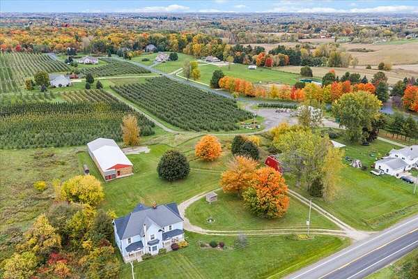 4.65 Acres of Land with Home for Sale in Sparta, Michigan