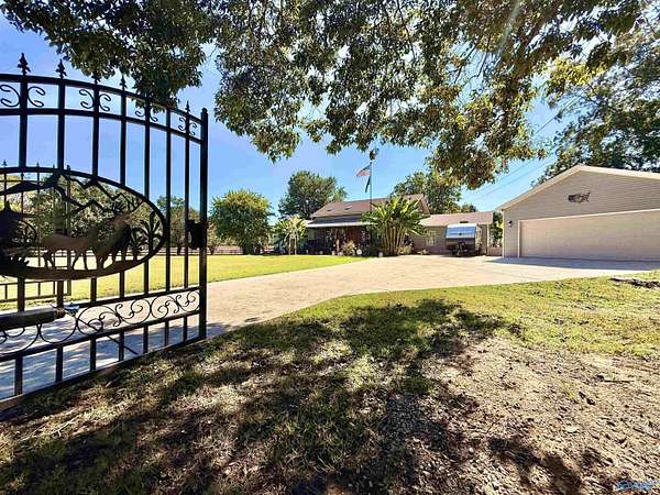 1.6 Acres of Land with Home for Sale in New Market, Alabama