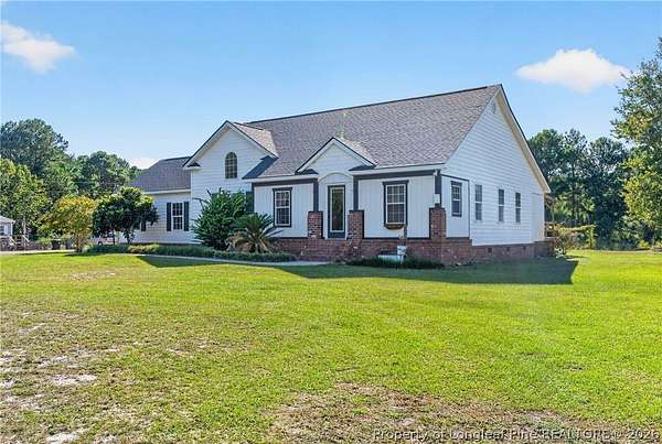 8.78 Acres of Land with Home for Sale in Sunset Beach, North Carolina