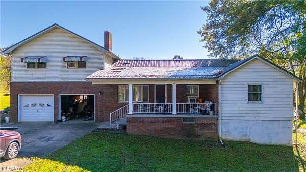 7.87 Acres of Land with Home for Sale in Powhatan Point, Ohio