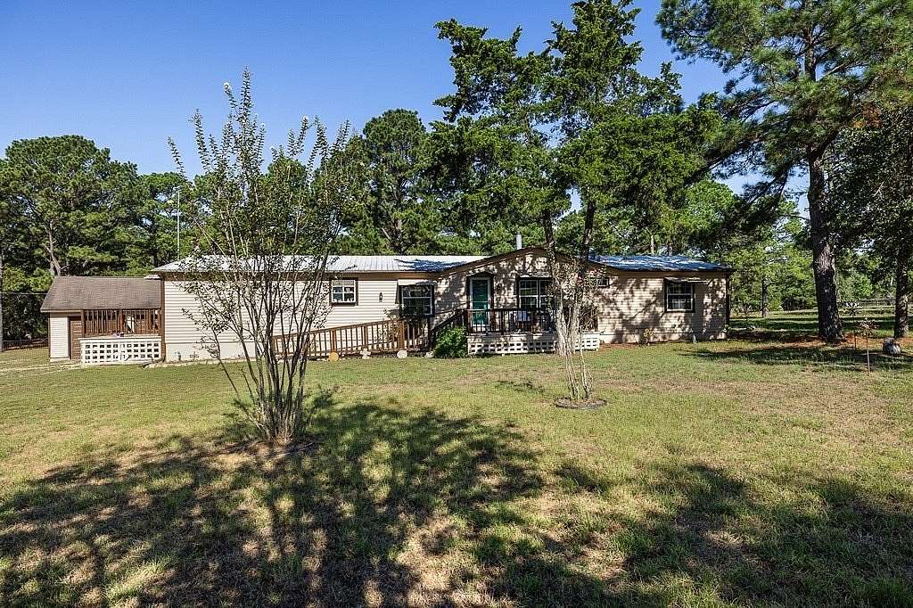 4.35 Acres of Land with Home for Sale in Smithville, Texas