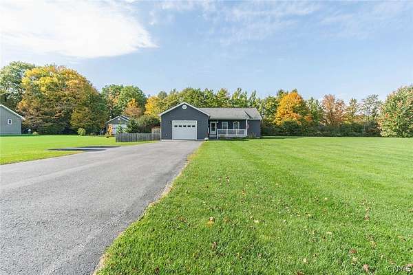 1.89 Acres of Land with Home for Sale in Dexter, New York