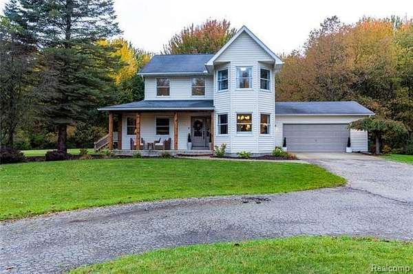 10.9 Acres of Recreational Land with Home for Sale in Elba Township, Michigan
