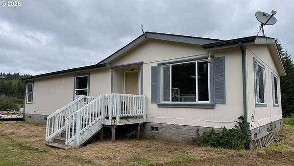 5 Acres of Land with Home for Sale in Florence, Oregon