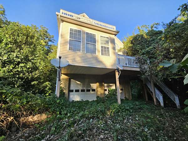 4.8 Acres of Land with Home for Sale in Madisonville, Tennessee